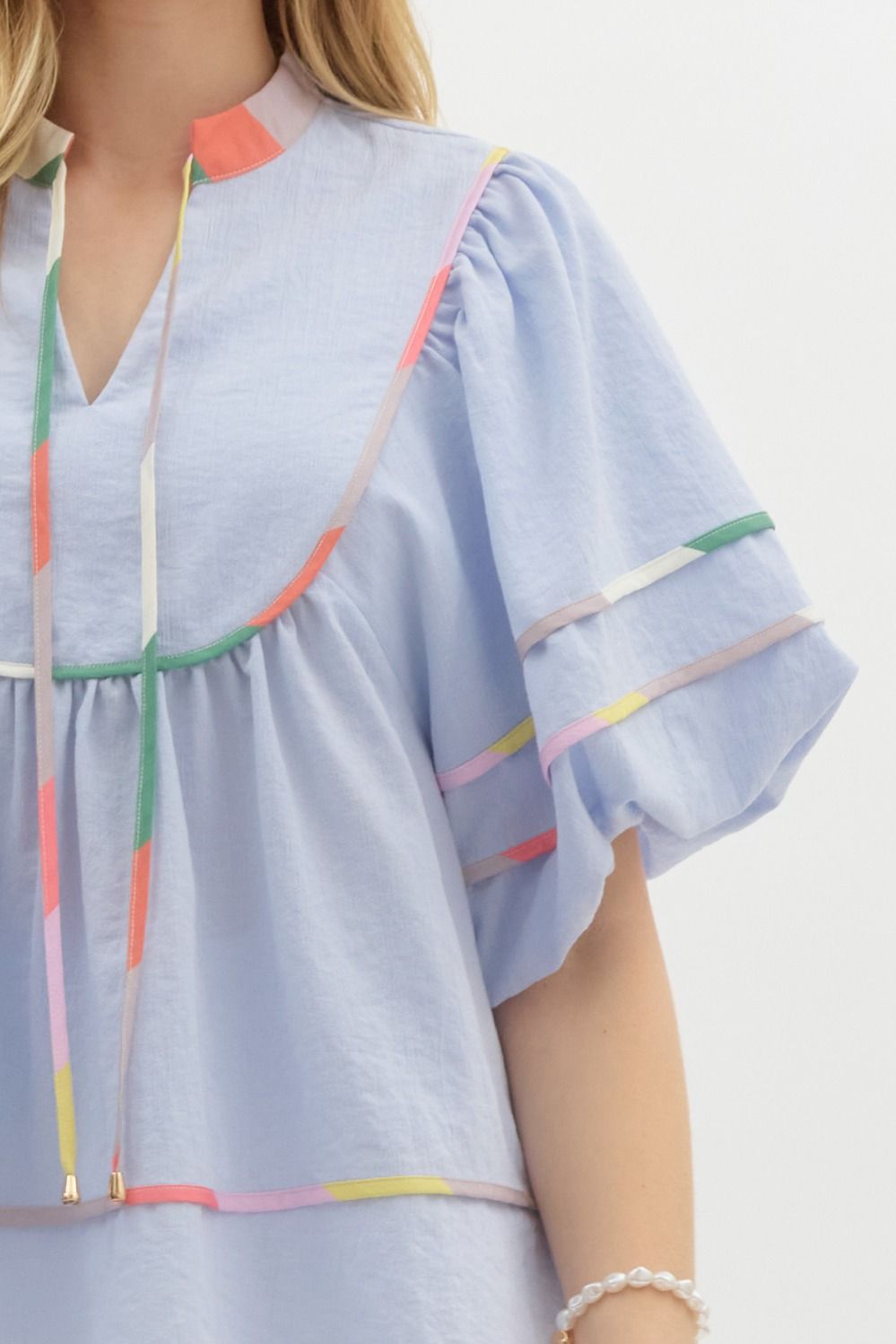 Blue Solid Short Puff Sleeve V-Neck Top, Contrasting Multi-colored Trim Detail, Self-tie detail at neckline
