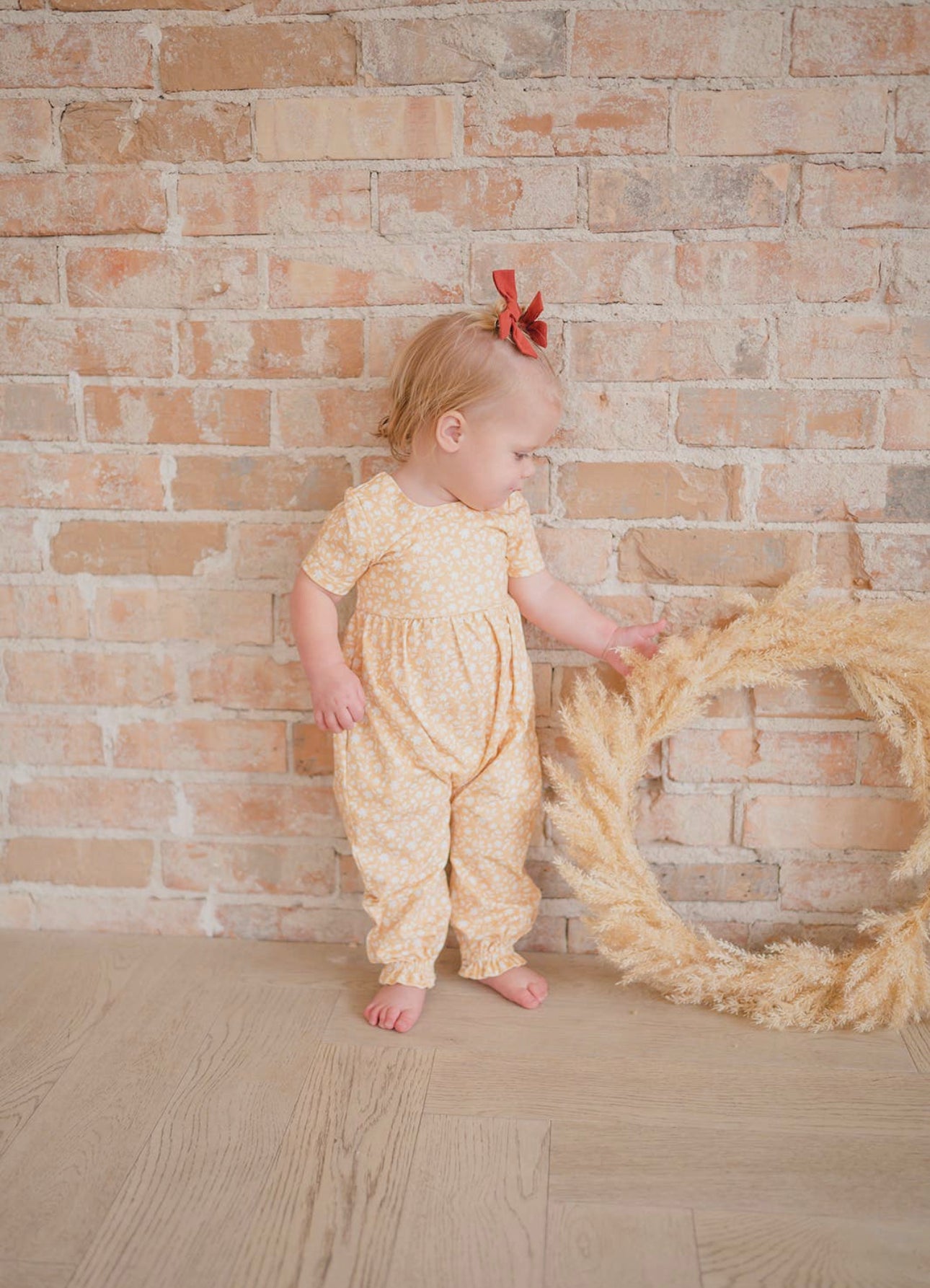 Rosie Romper in Custard Floral Baby Romper