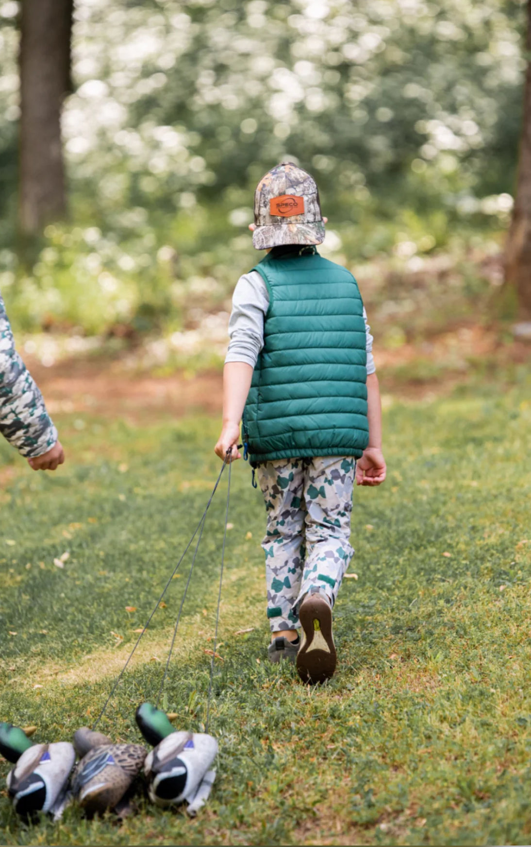 Kid’s Puffer Vest in Posy Green with Sea Turtle Print Liner