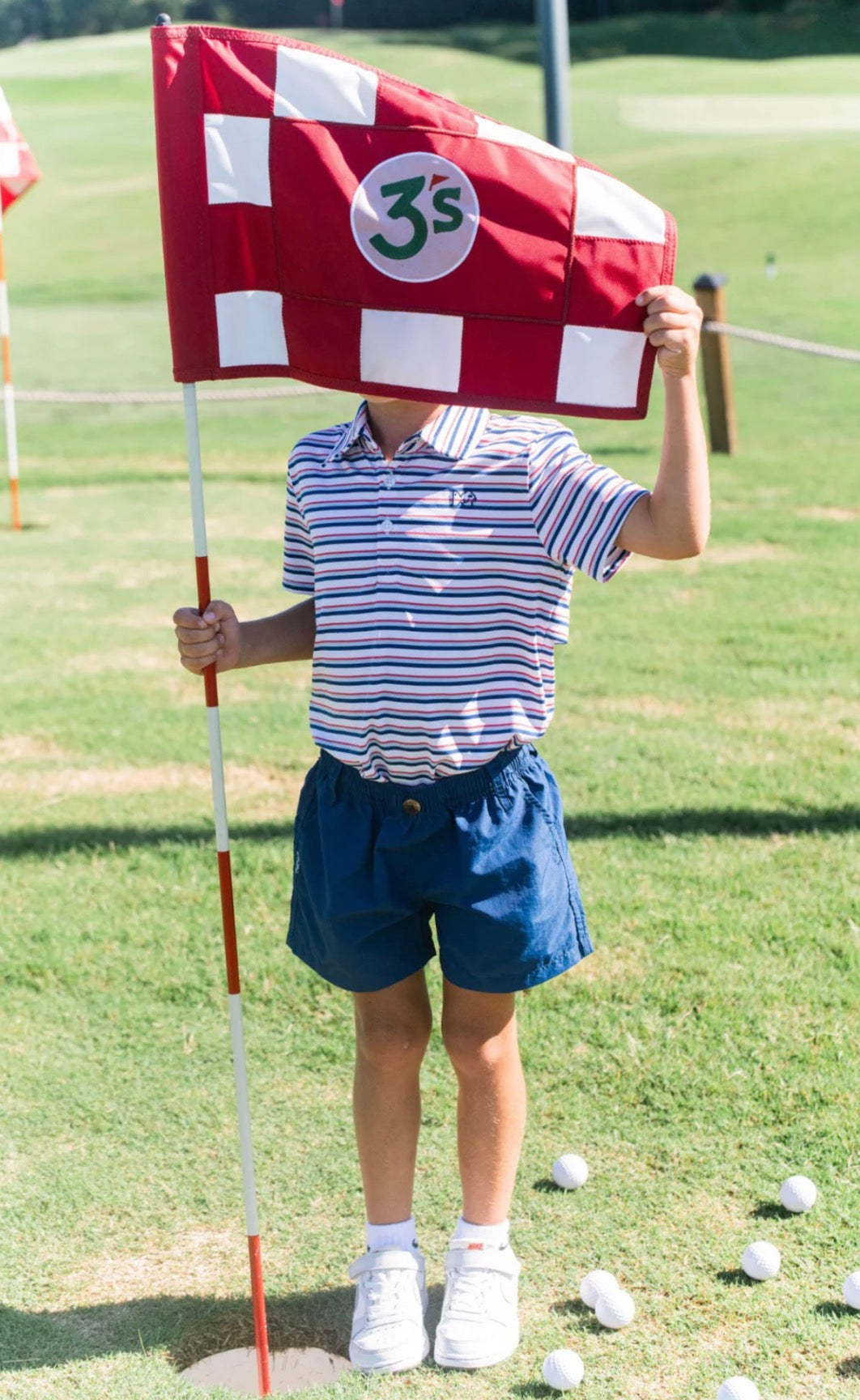 BOYS' OUTRIGGER PERFORMANCE SHORTS IN CLASSIC NAVY PEONY