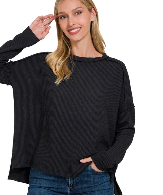 Black- Raised Rib Raw Edge Boat
Neck Long Sleeve Top